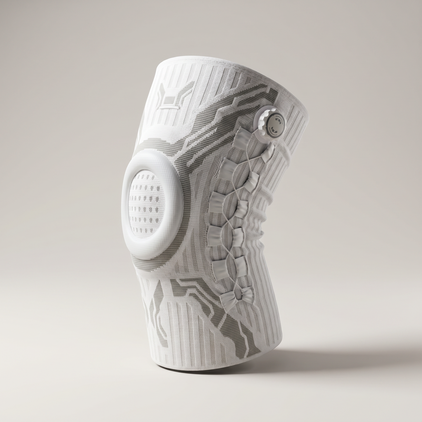 KINEO Pro Smart Knee Brace — white knit hero, 3/4 angle on soft grey background